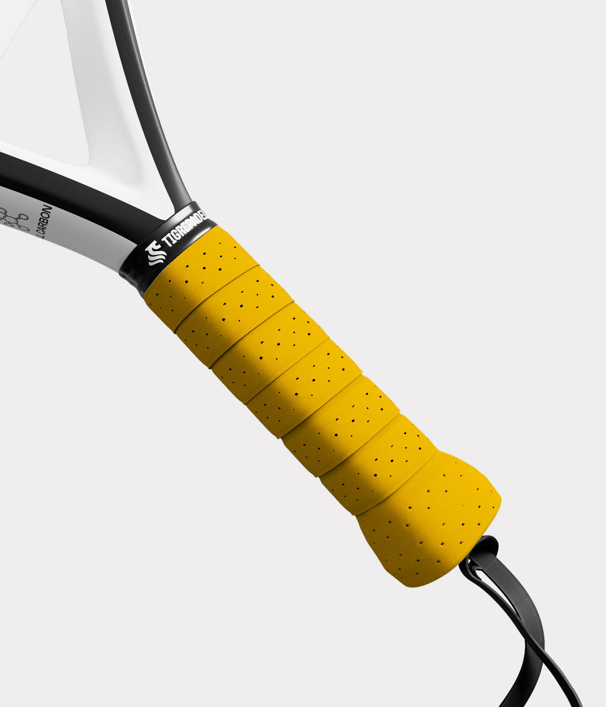 Close-up van gele padel overgrip met textuur voor extra grip van TigrePadel