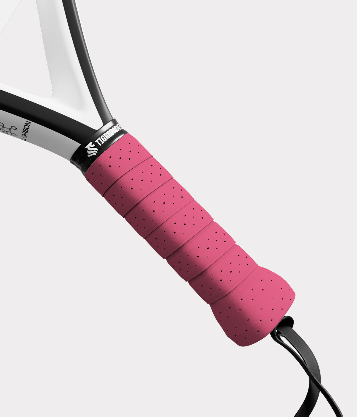 Roze padel overgrip van TigrePadel met geperforeerd design voor extra comfort en grip.